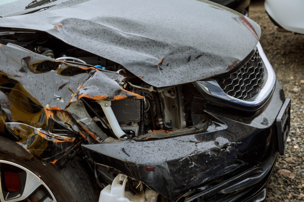 detail-with-damage-automobile-after-a-car-crash-accident-closeup-1.jpg