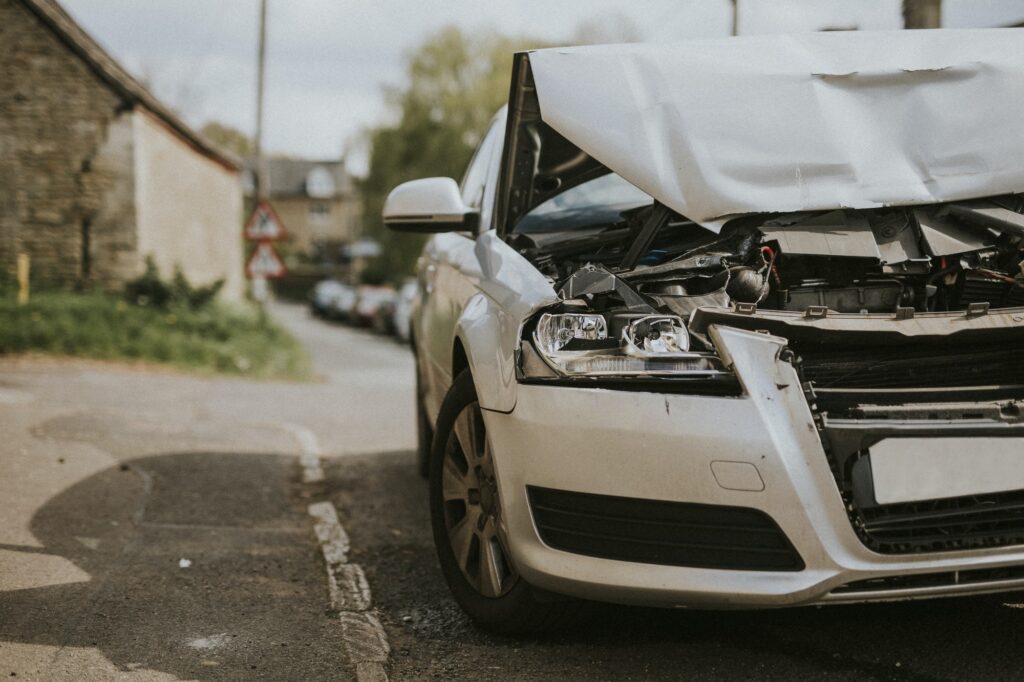wrecked-car-parked-on-the-street-after-a-car-crash.jpg